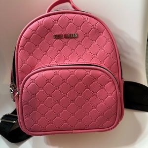 Pink Steve Madden backpack purse new never used.